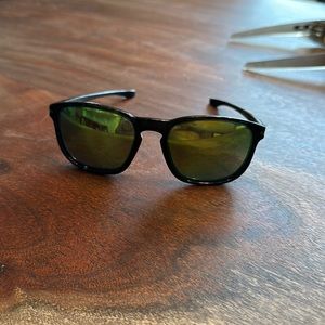 Oakley enduro sunglasses black with green lenses.